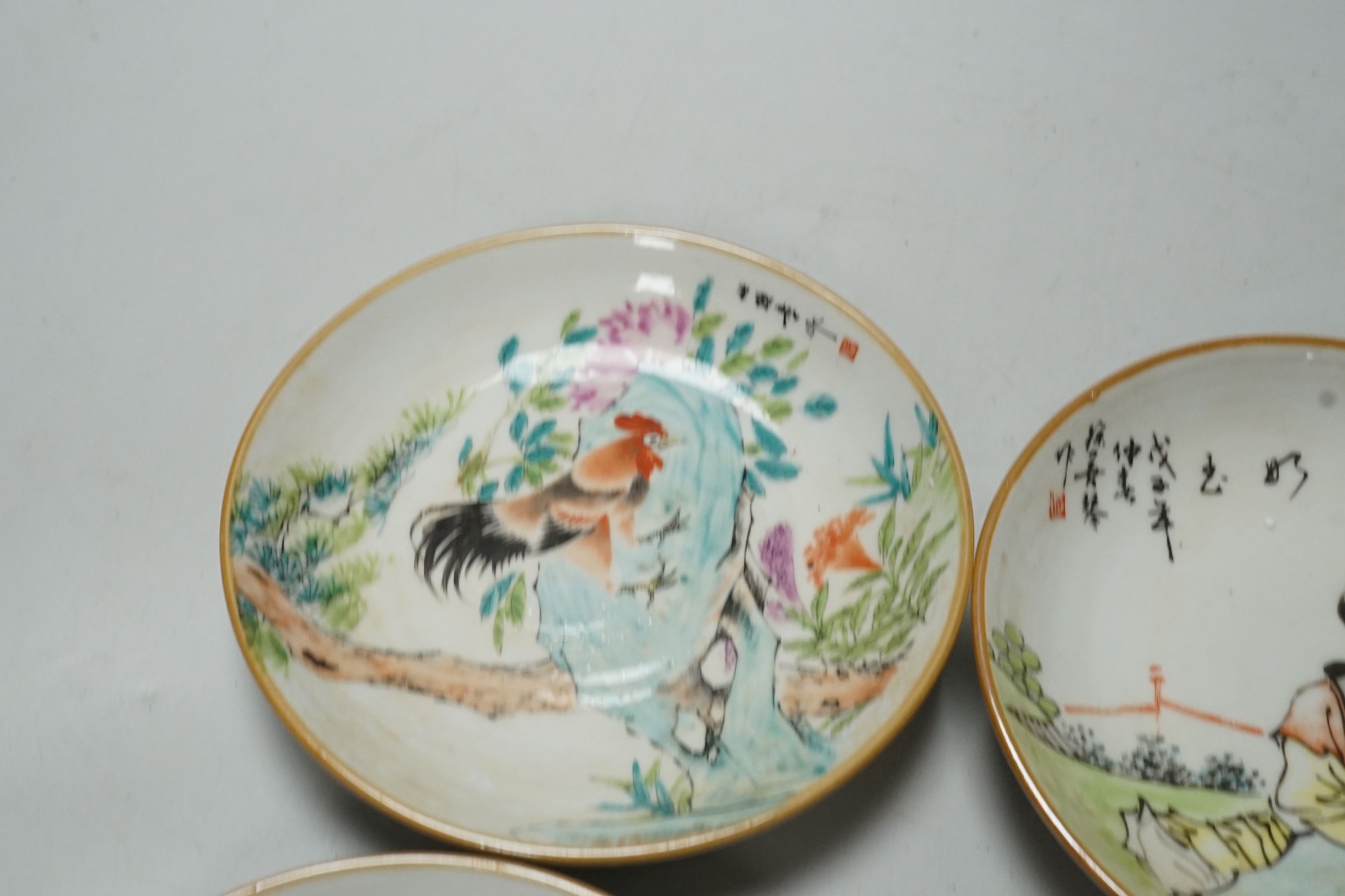 A set of four Chinese saucer dishes, 13cm diameter